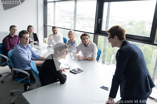 Image of Group of young people meeting in startup office