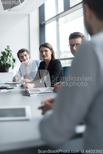 Image of Business Team At A Meeting at modern office building