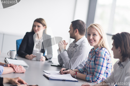 Image of Group of young people meeting in startup office