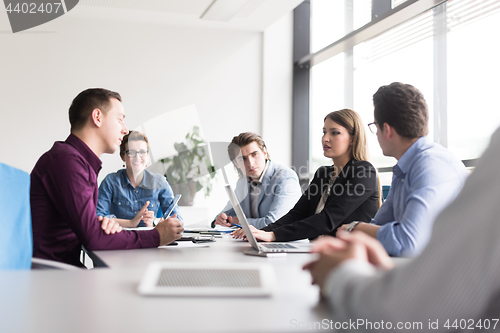 Image of Business Team At A Meeting at modern office building