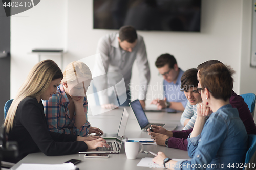 Image of Group of young people meeting in startup office