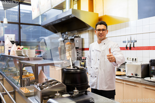 Image of chef at kebab shop showing thumbs up