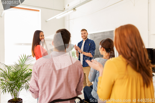 Image of creative team celebrating success