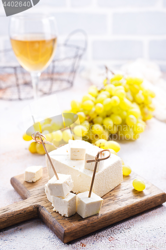 Image of wine and cheese