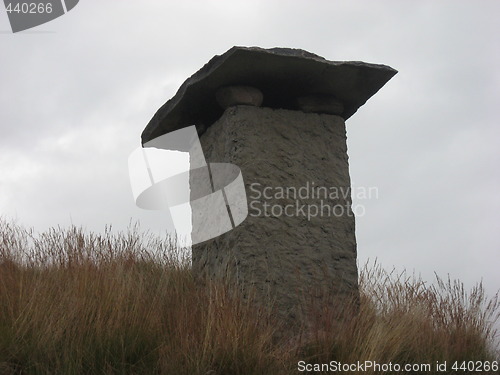 Image of Old roof with stone pipe