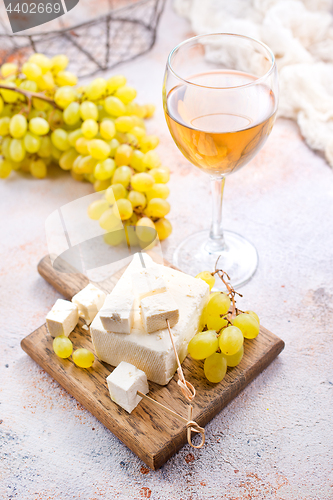 Image of wine and cheese