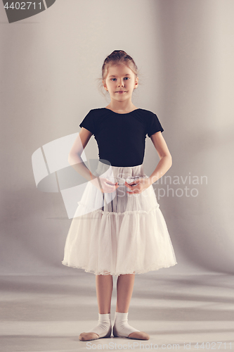 Image of The little balerina dancer on gray background