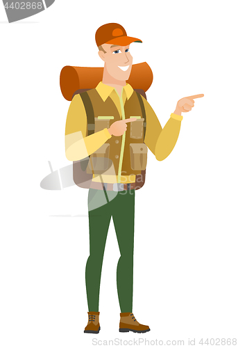 Image of Caucasian traveler pointing to the side.