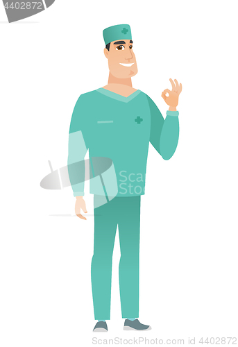 Image of Smiling doctor showing ok sign.