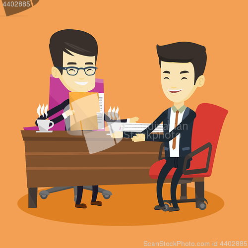 Image of Two businessmen during business meeting.