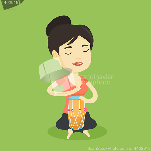 Image of Woman playing ethnic drum vector illustration.