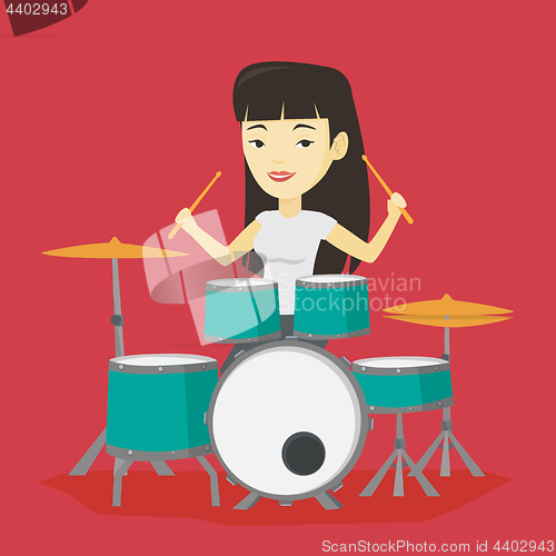 Image of Woman playing on drum kit vector illustration.