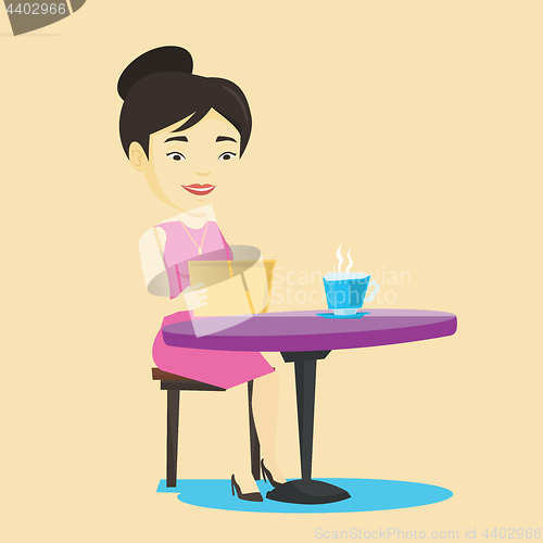 Image of Woman surfing in the social network in cafe.