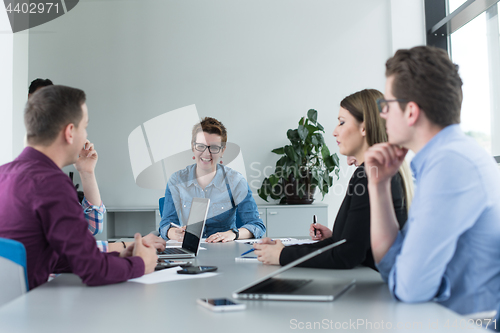 Image of Business Team At A Meeting at modern office building