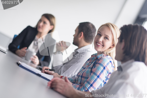 Image of Group of young people meeting in startup office