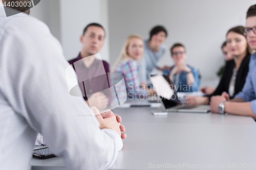 Image of Business Team At A Meeting at modern office building