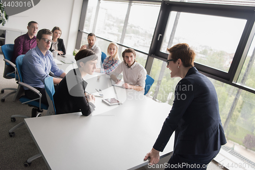 Image of Group of young people meeting in startup office