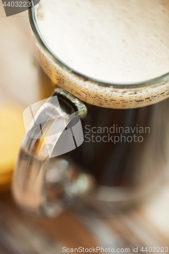 Image of close up of dark draft beer glass mug