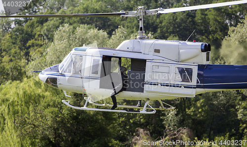 Image of Special forces in helicopter in a low flight