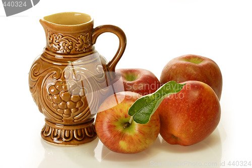 Image of Brown Wine Jug with Apples