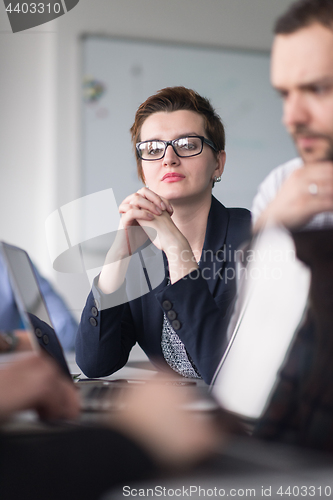 Image of Business Team At A Meeting at modern office building