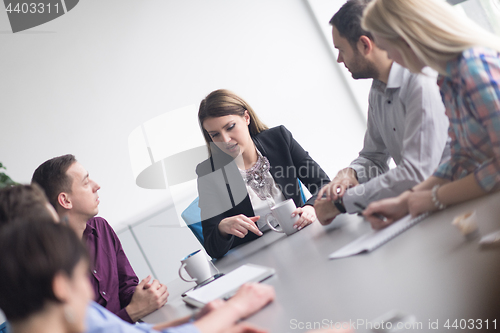 Image of Group of young people meeting in startup office