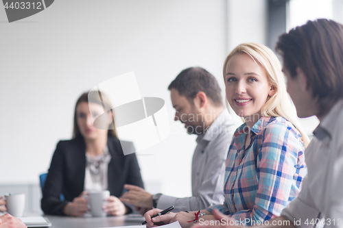 Image of Group of young people meeting in startup office