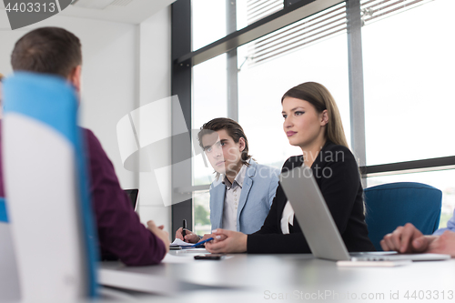 Image of Business Team At A Meeting at modern office building