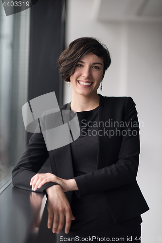 Image of Portrait of successful Businesswoman by the window