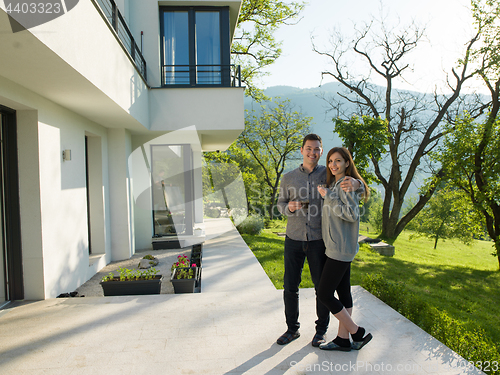 Image of couple enjoying morning coffee