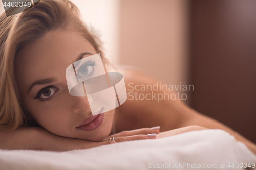 Image of woman laying on massage table
