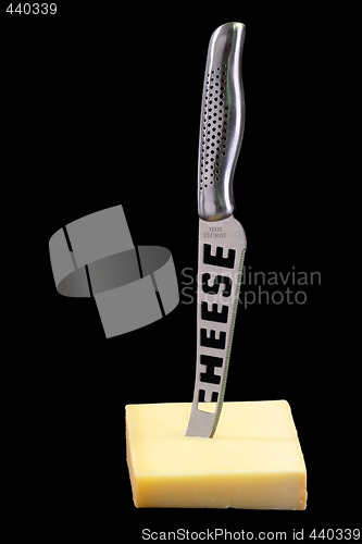 Image of Knife in a Cheese
