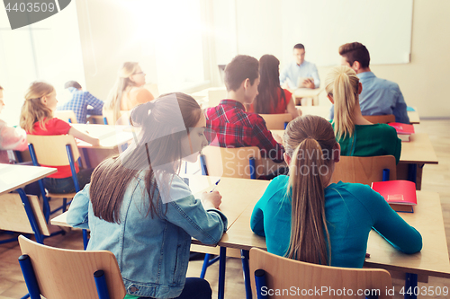 Image of group of students writing school test