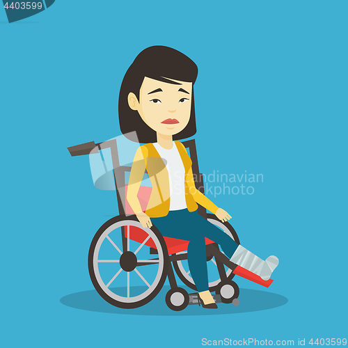 Image of Woman with broken leg sitting in wheelchair.