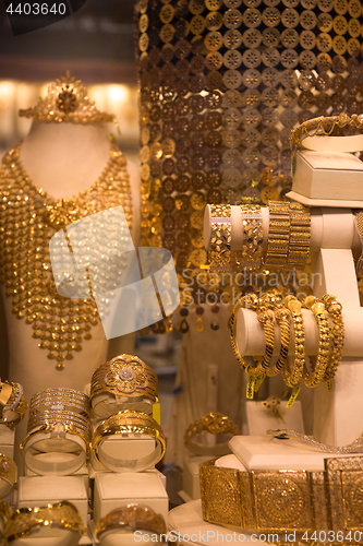 Image of gold jewelry in the shop window