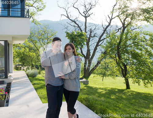 Image of couple enjoying morning coffee