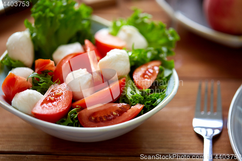 Image of close up of vegetable salad with mozzarella