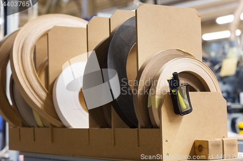 Image of veneer or edge band tapes at woodworking factory