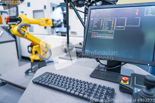 Image of Robotic Arm modern industrial technology. Automated production c