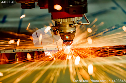 Image of CNC Laser cutting of metal, modern industrial technology.