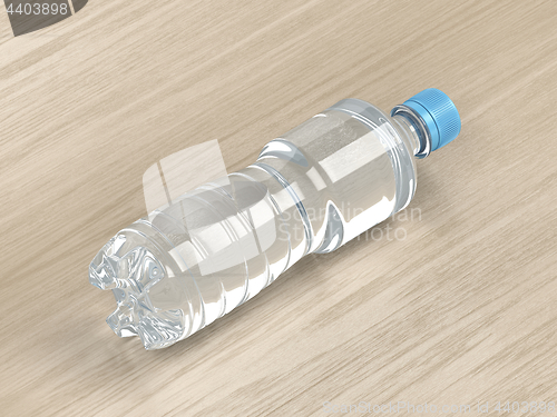 Image of Water bottle on wood background