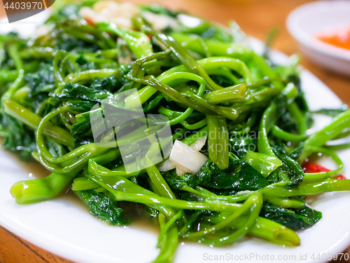 Image of Vietnamese fried morning glory, rau muong xao toi