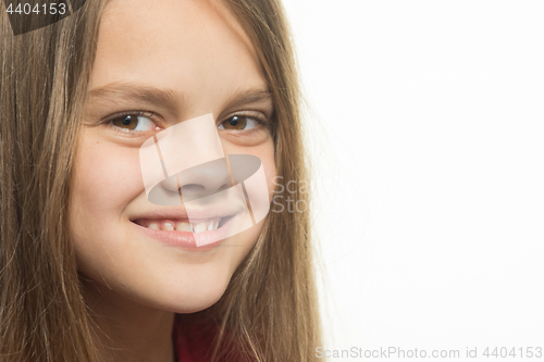 Image of Close-up portrait of a smiling teenage girl