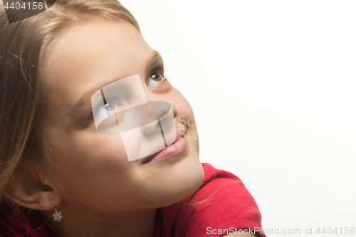 Image of Close-up portrait of a girl who looked up