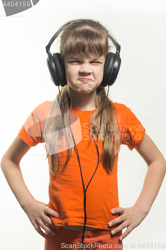 Image of Belt portrait of a twisted girl in headphones locators