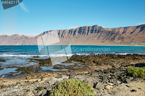 Image of Landscape with volcanic hills and atlantic ocean in Lanzarote 