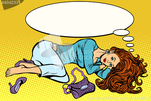 Image of Dressed beautiful woman lies and dreams