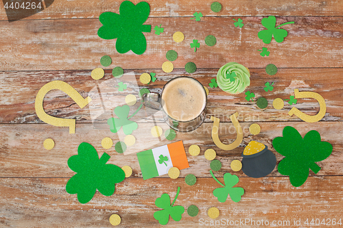 Image of glass of beer and st patricks day decorations