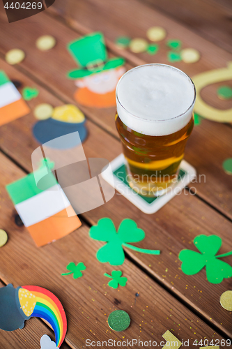 Image of glass of beer and st patricks day decorations