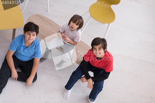 Image of boys in a new modern home